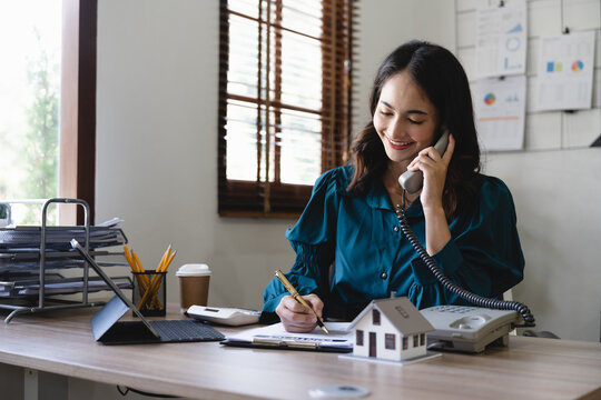 Homeowner sharing details about a Florida house on the phone